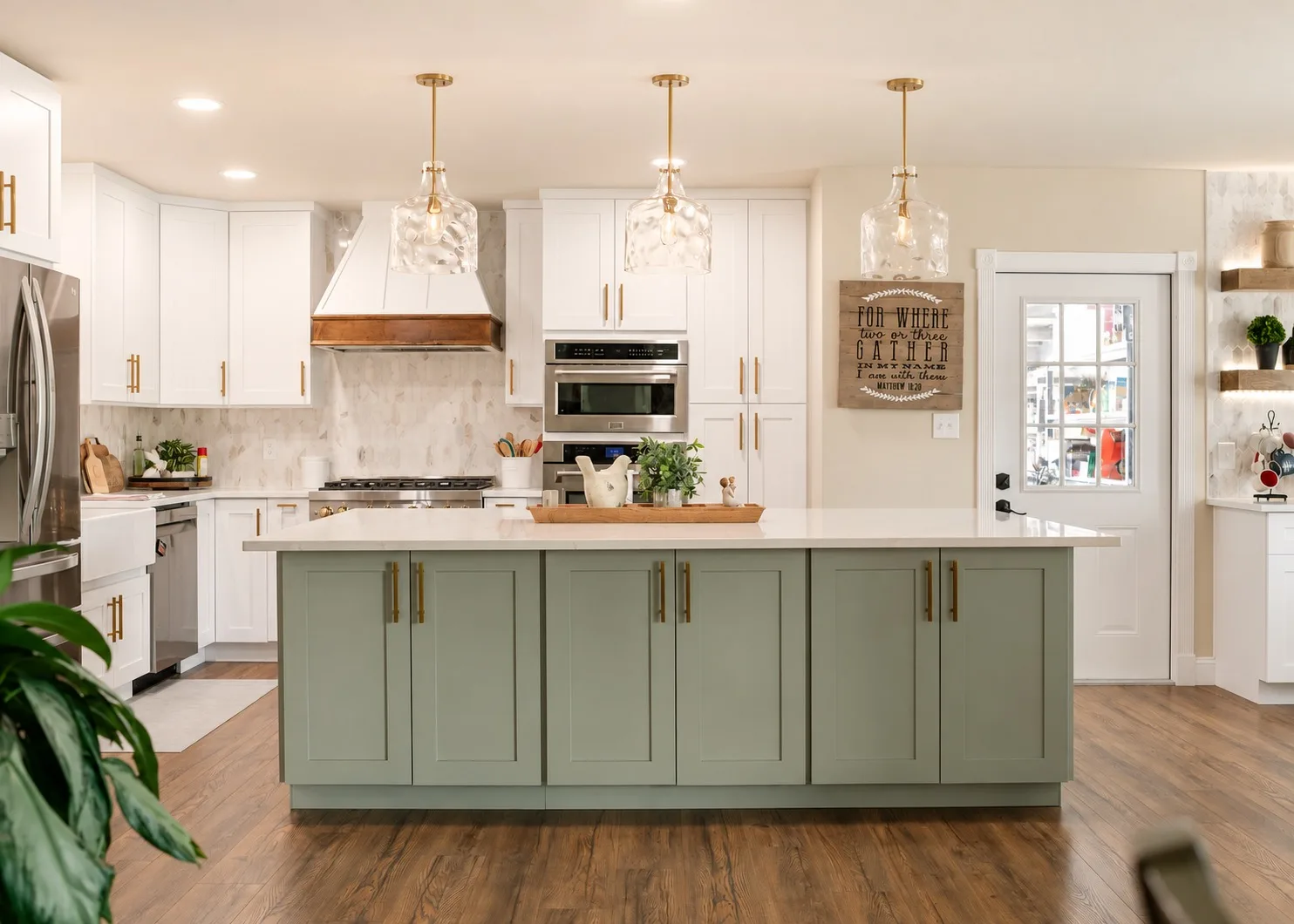 Modern farmhouse kitchen remodel in Tampa, FL with white cabinets and island