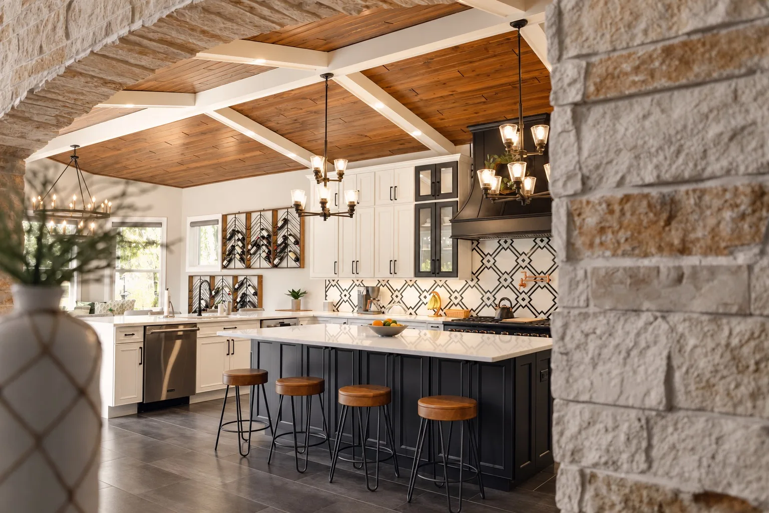 Luxury kitchen remodel in Tampa, FL with wood ceiling and black island