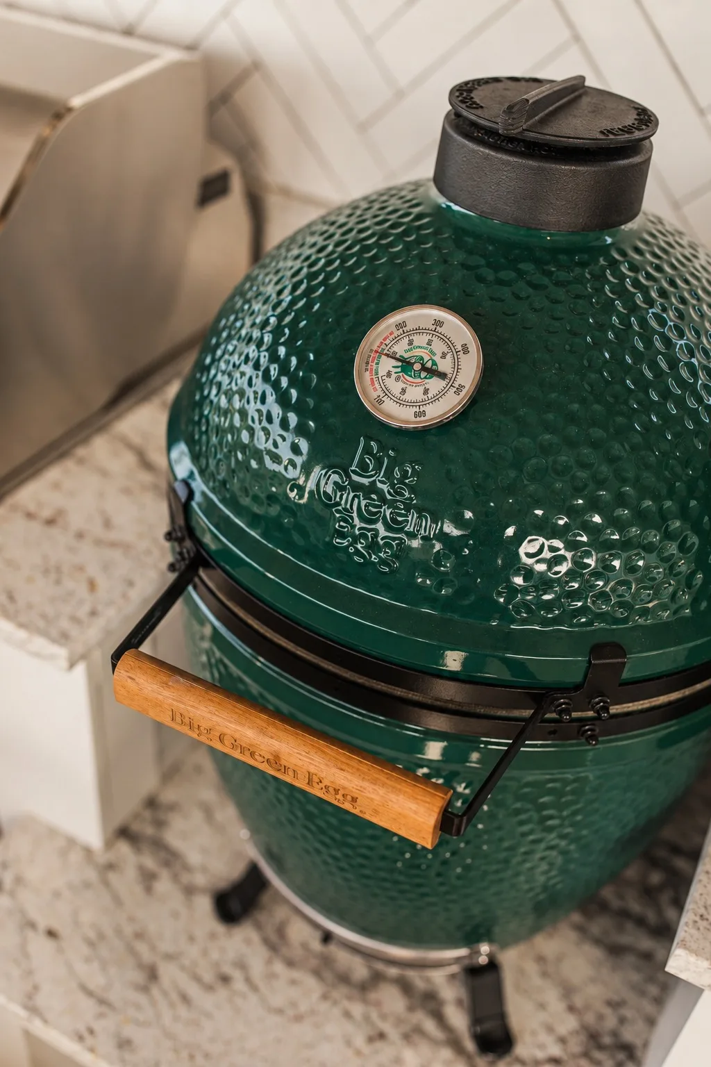 Outdoor kitchen in Tampa, FL with built-in Big Green Egg grill