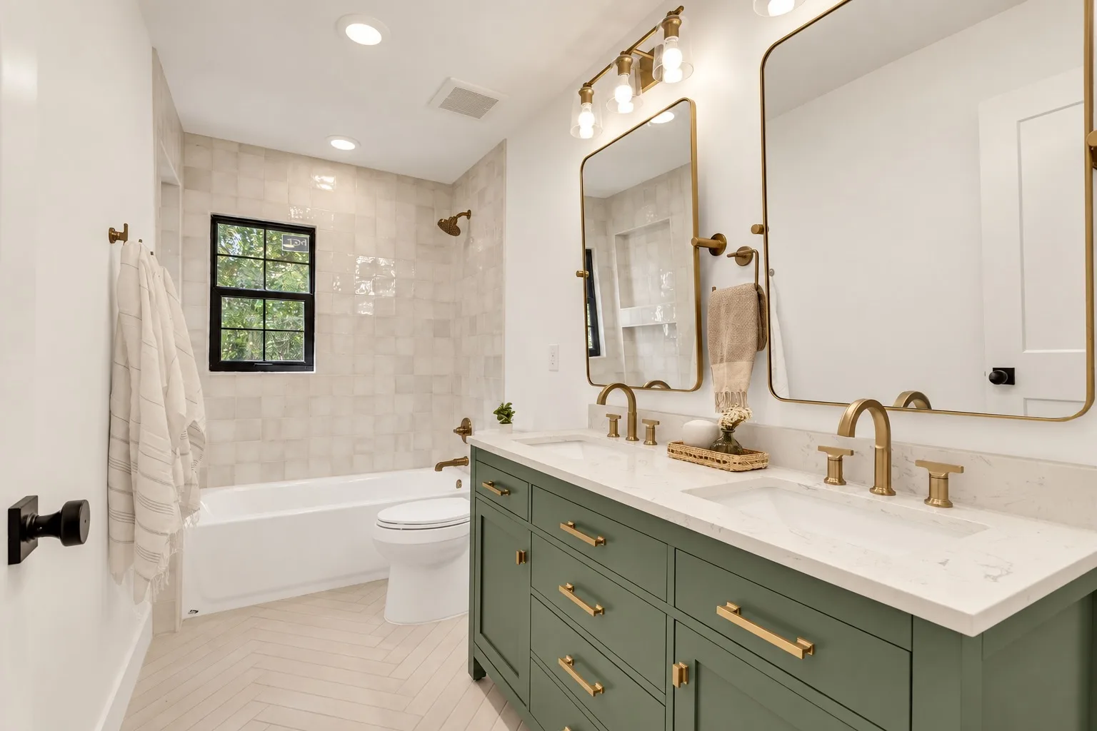 Bathroom remodel in Tampa, FL with green vanity cabinetry