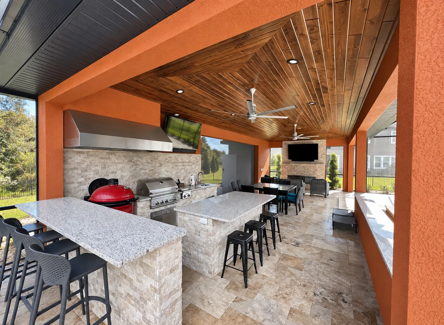 Outdoor kitchen under a covered patio in Tampa, FL