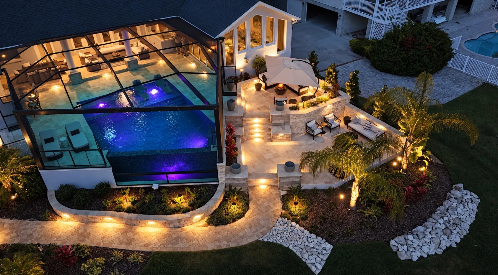 Aerial view of screened pool and lanai in Tampa, FL at night