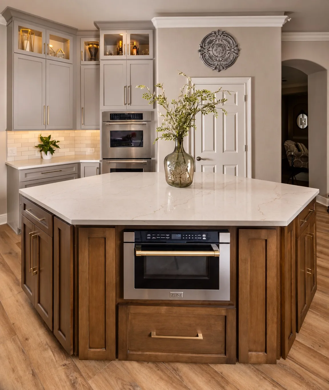 Transitional kitchen remodel in Tampa, FL with gray cabinets, wood island, and quartz countertops