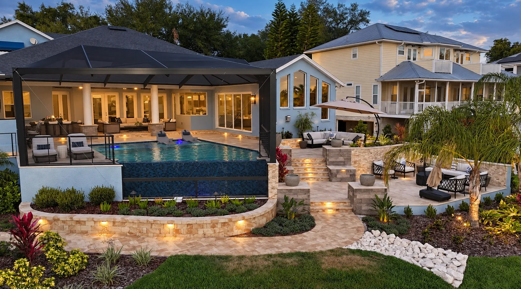 Elevated pool and screened lanai in Tampa, FL at dusk