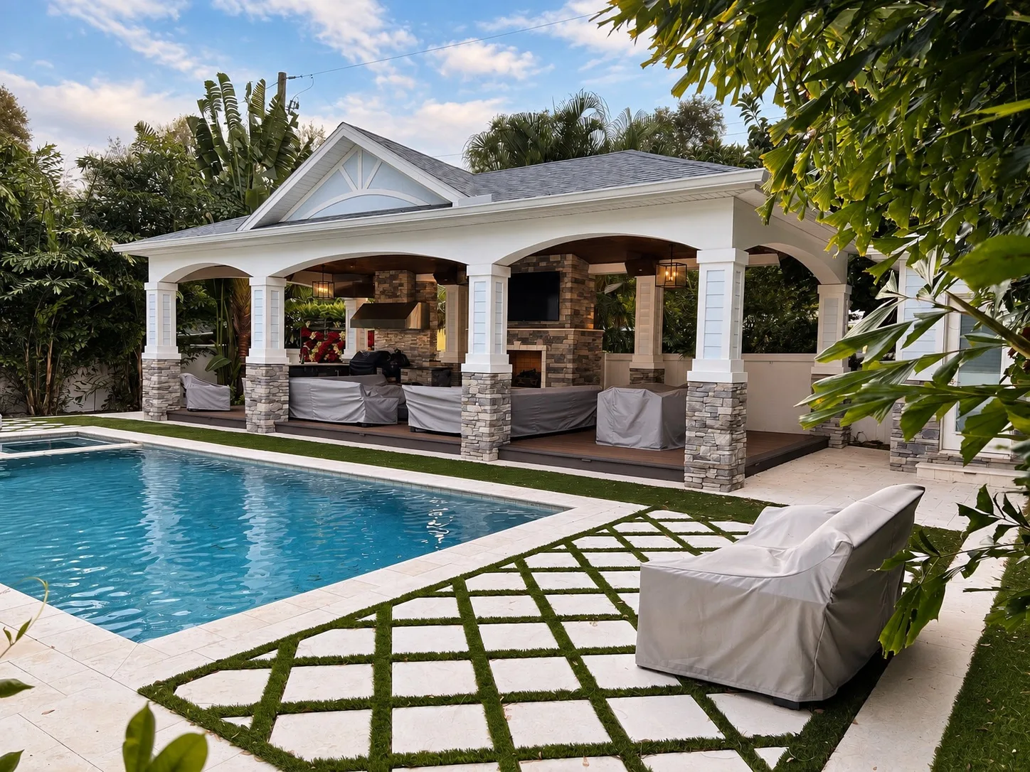 Luxury pool cabana and outdoor living space in Tampa, FL