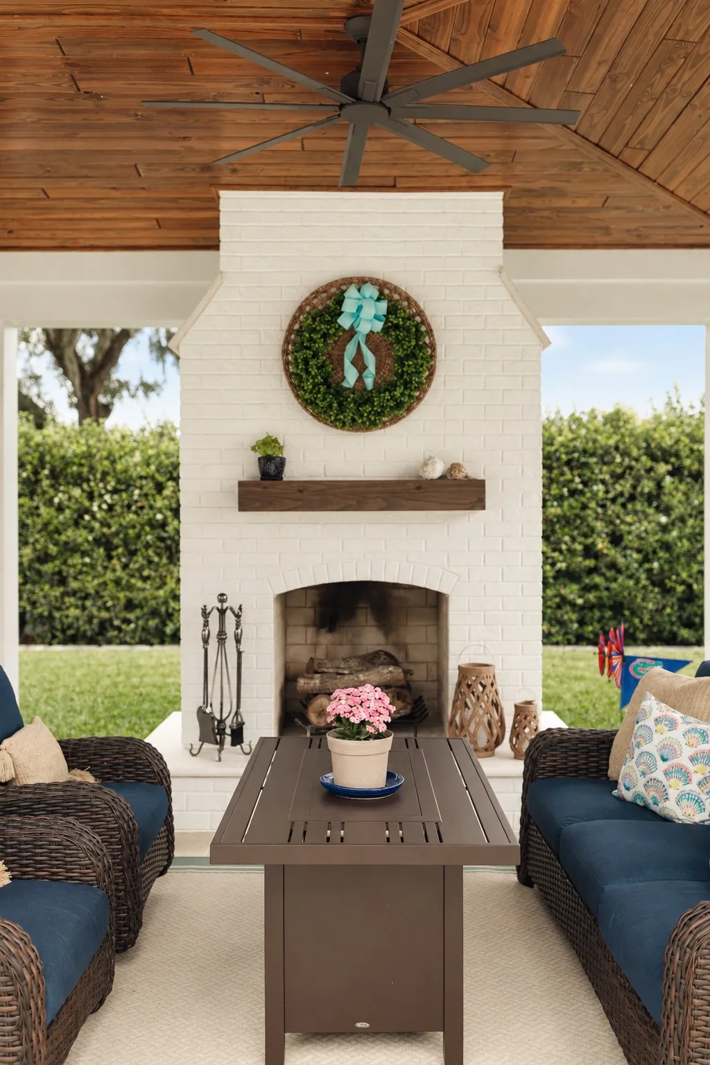 Outdoor pavilion in Tampa, FL with fireplace and seating area