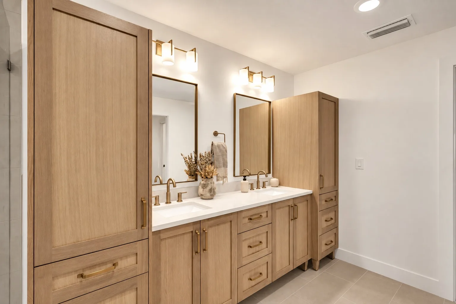 Bathroom remodel in Tampa, FL with light oak double-sink vanity